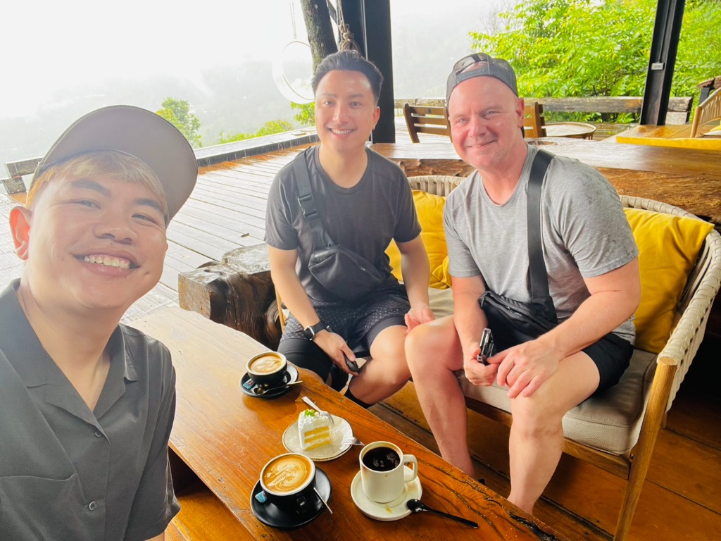 Highland cafe coffee and mountain views with guests